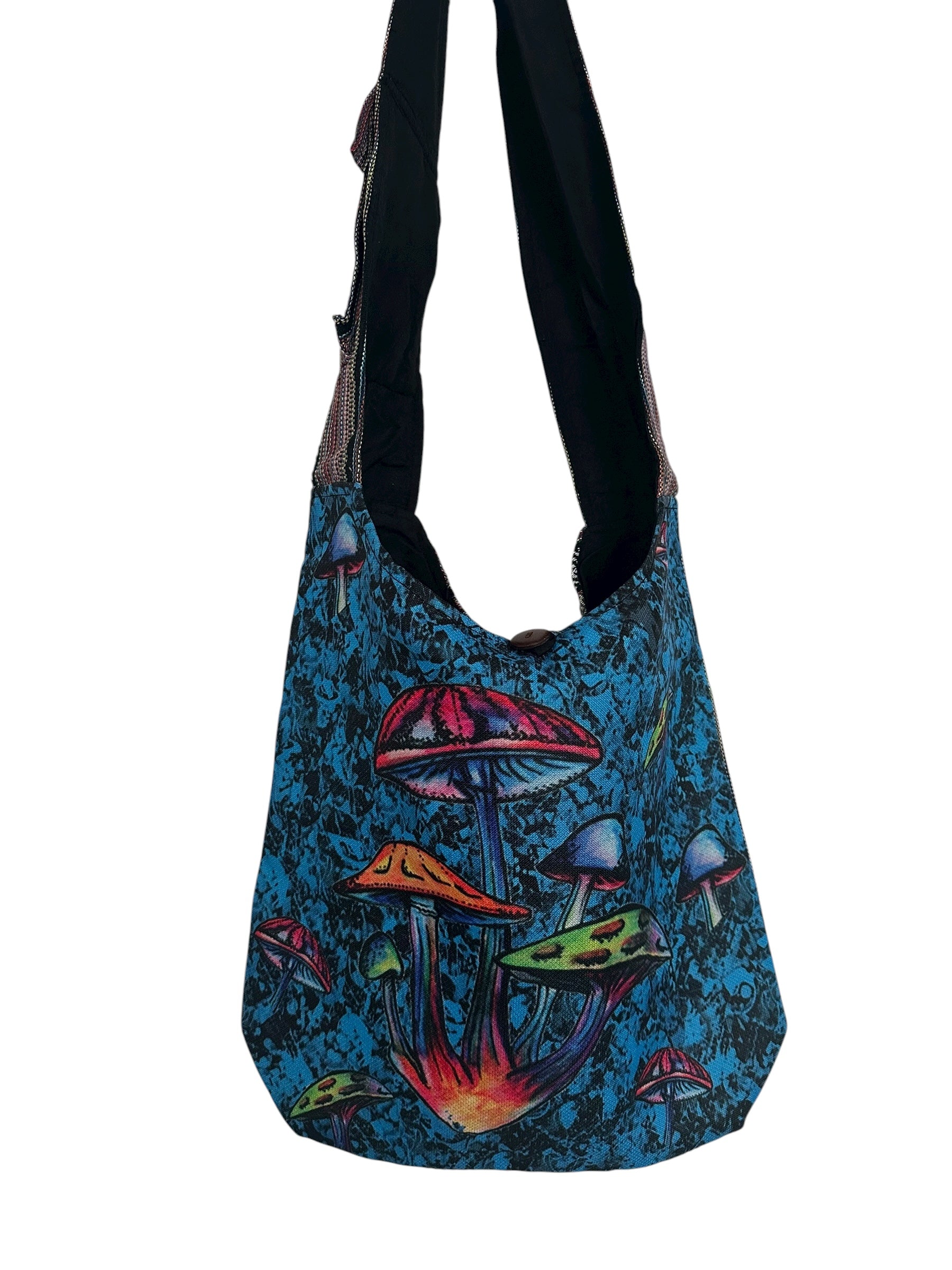 Bright blue cotton sling bag with multicolored psychedelic mushroom design.