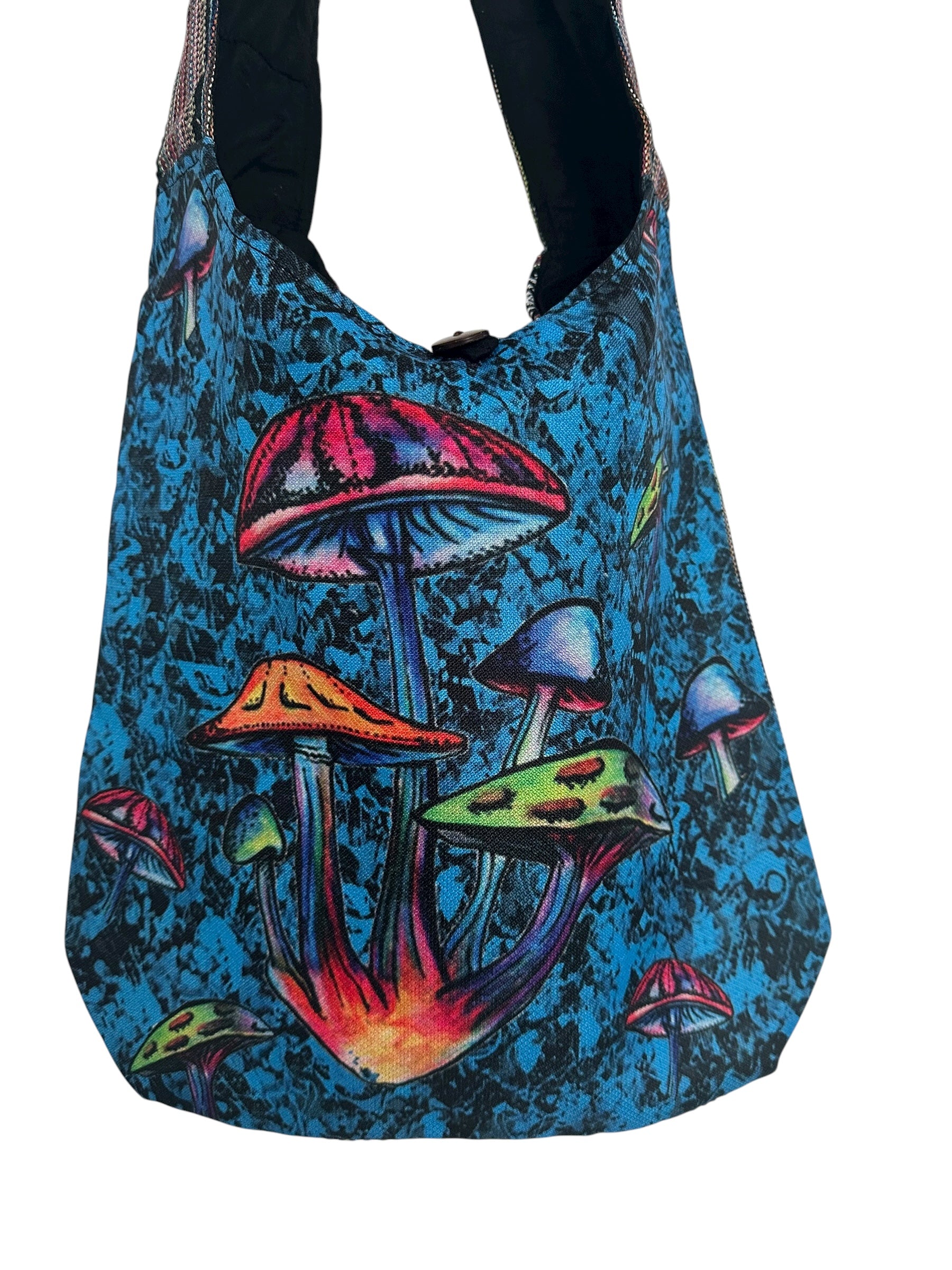 Bright blue cotton sling bag with multicolored psychedelic mushroom design.