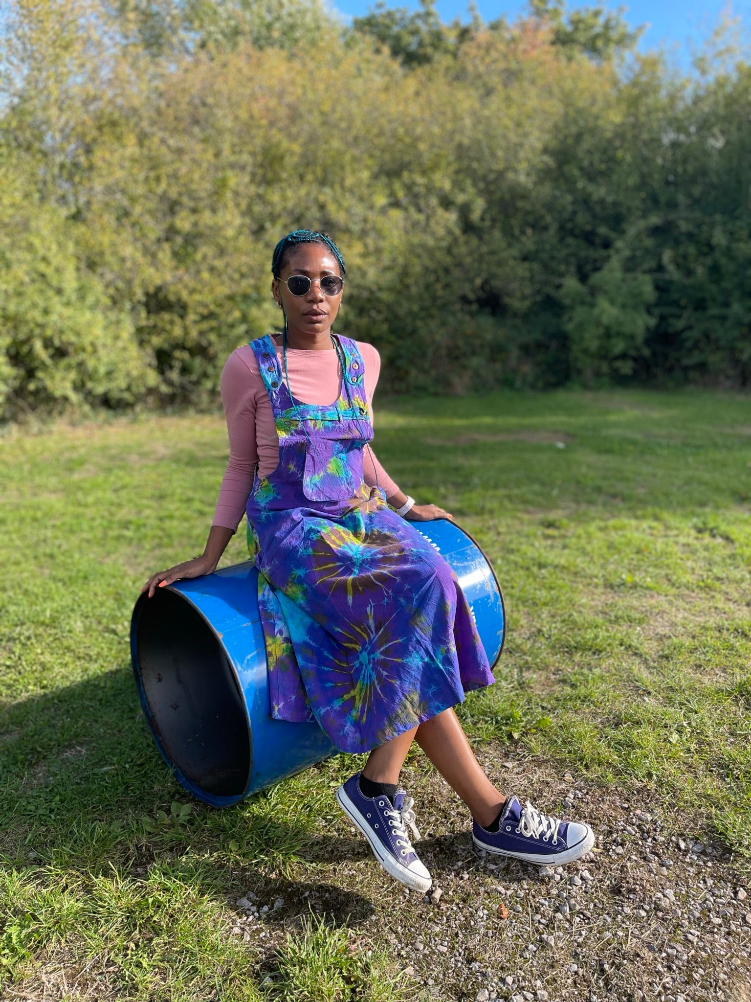 Original Hidden Treasure photograph of a woman wearing our colourful handmade dungaree dress