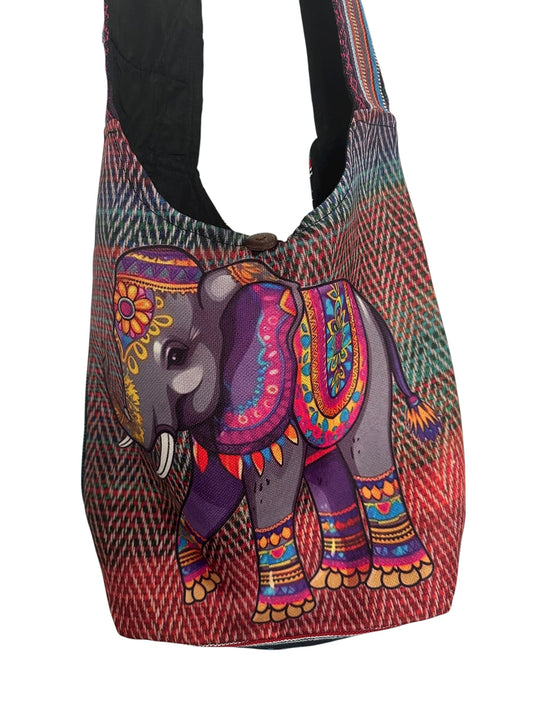Colorful boho-style elephant print cotton sling bag with zip and button closure, handmade hobo shoulder bag.